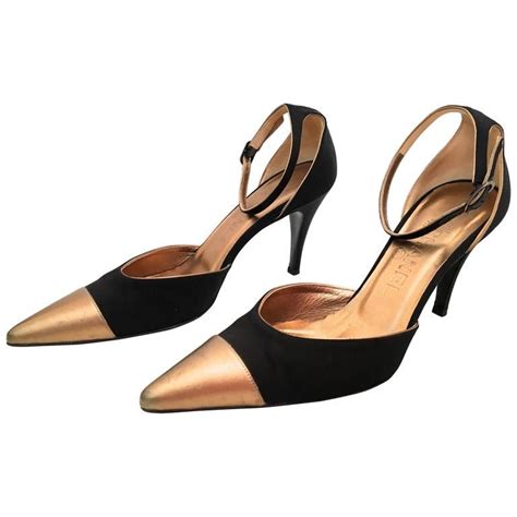 chanel shoes black and gold|Chanel heels for women.